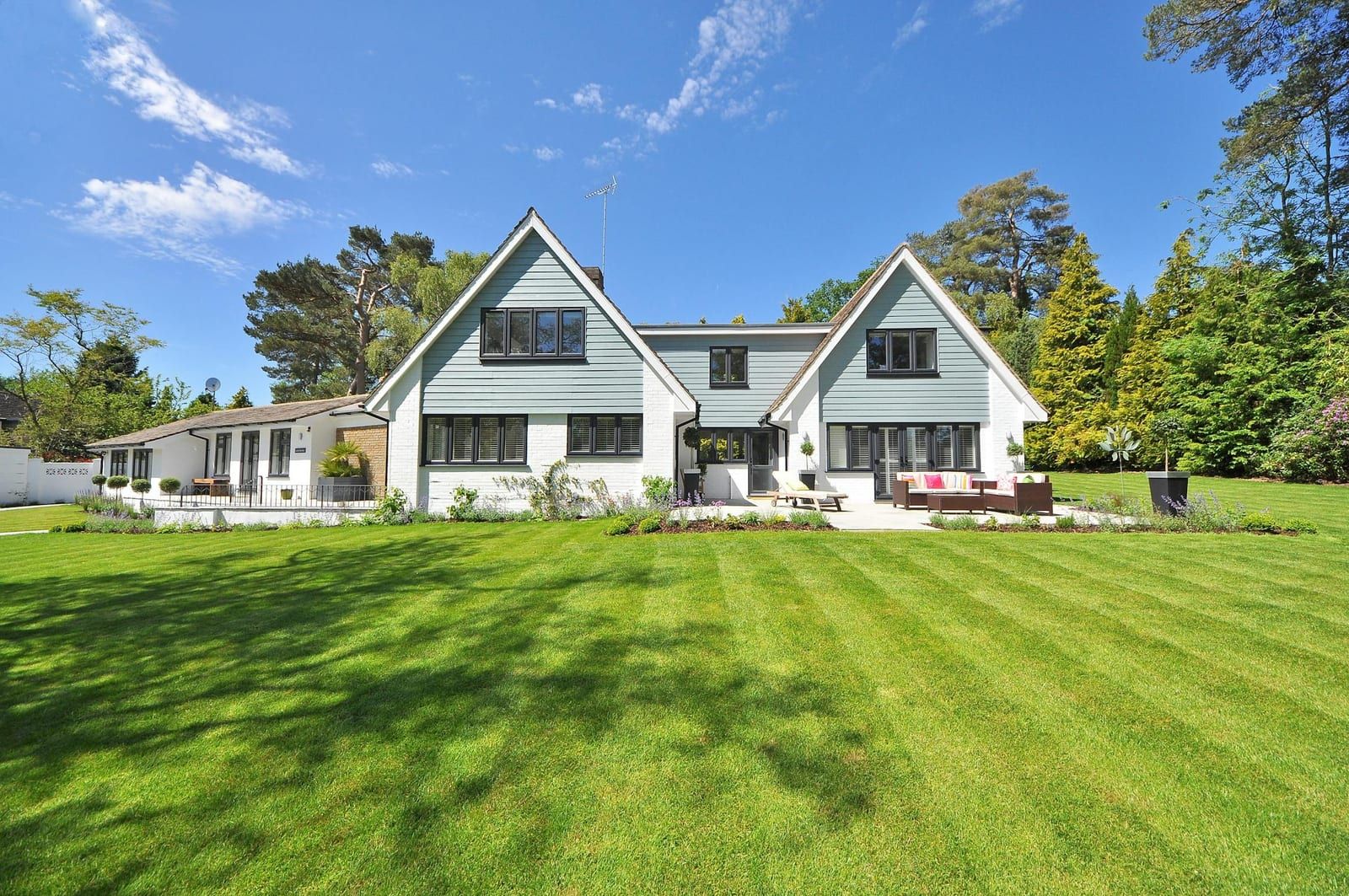Defensible-space inspection at a Lamorinda property — golden hills, oak trees, single-family home